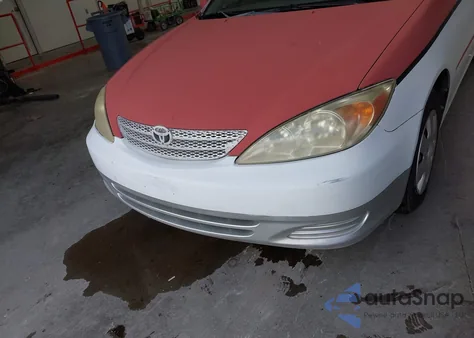 2003 Toyota Camry Le z USA, uszkodzony, nr VIN 4T1BE32K33U673674